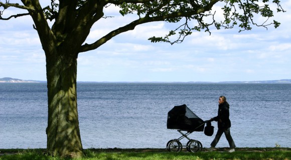 woman-with-a-baby-carriage